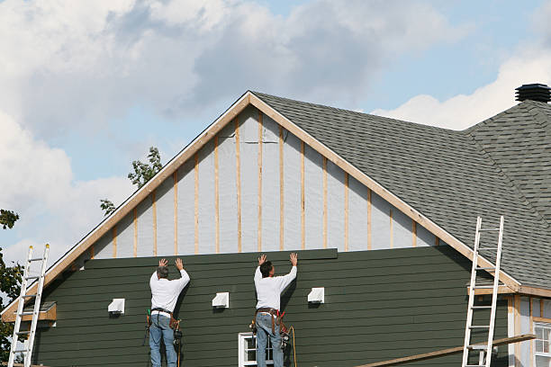 Professional Siding Contractor technician working in Champlain, VA